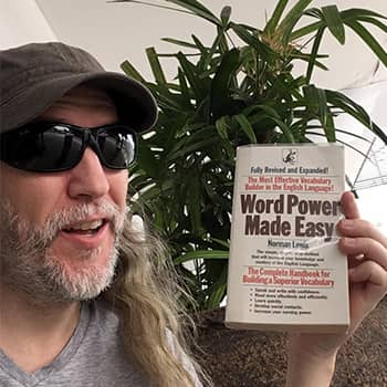 Anthony Metivier with a copy of Word Power Made Easy