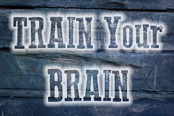 Image with the words "Train Your Brain" to illustrate how to increase memory using movies