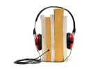 Image of Books with headphones to express the concept of the audiobook