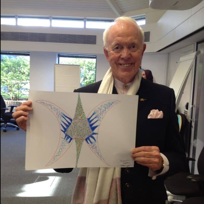 Tony Buzan with butterfly artwork by Anthony Metivier