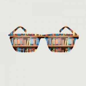 Sunglasses reflecting a scholarly bookshelf