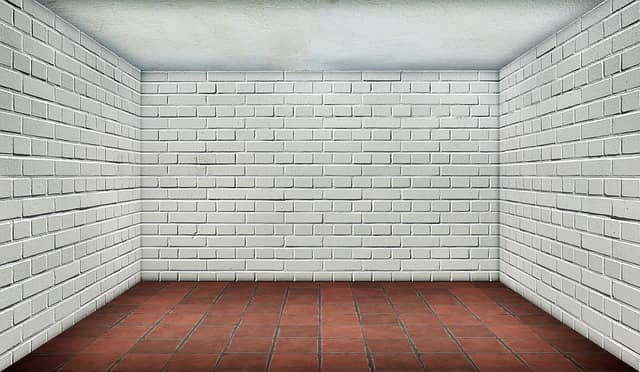 Photo of an empty room with white walls