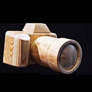 Image of a wooden camera for iconic memory blog post