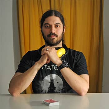 Portrait of Memory Athlete Braden Adams with a deck of cards