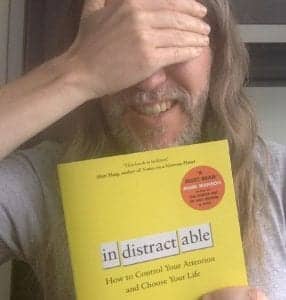 Anthony Metivier with a copy of Indistractable