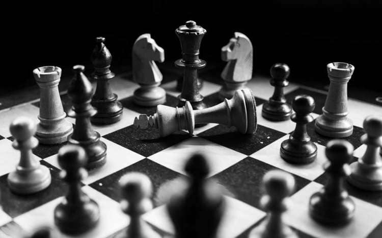 A black and white photo of a chess board. Chess can help you maintain cognitive skills as you age.