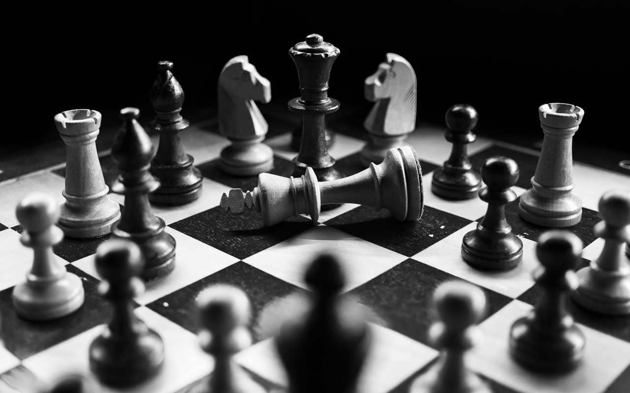 A black and white photo of a chess board. Chess can help you maintain cognitive skills as you age.