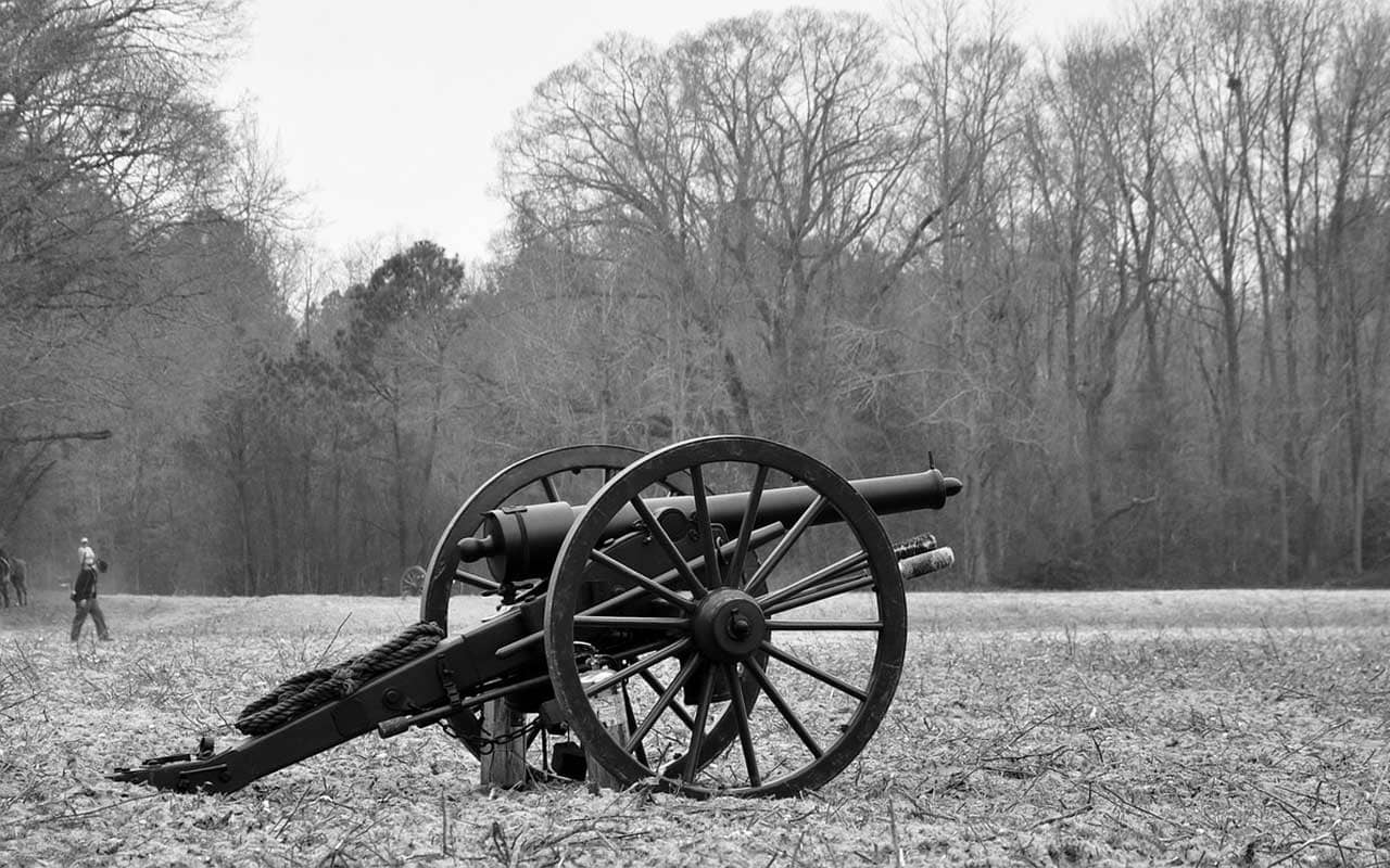 A cannon on a battlefield; a part of what you might learn about the Civil War, making it an explicit memory.