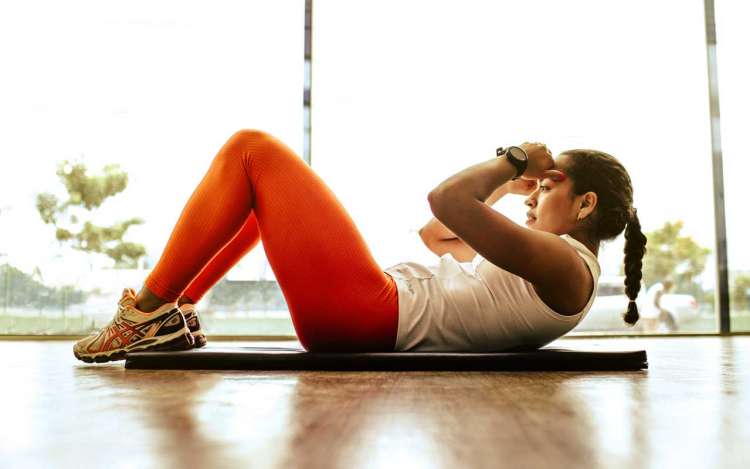 A woman exercising to keep her brain and body healthy.