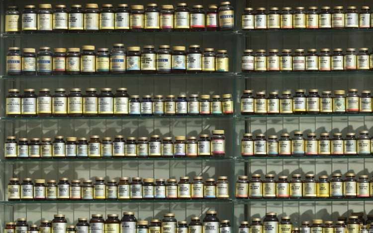 A wall of supplement bottles