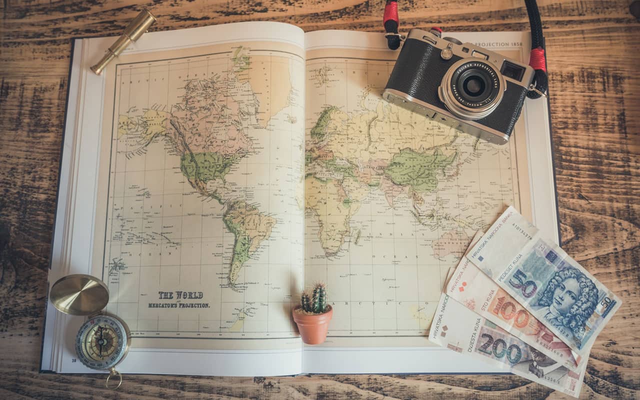 A world map, camera, and pocketwatch. All types of words you could use a Memory Palace to memorize.