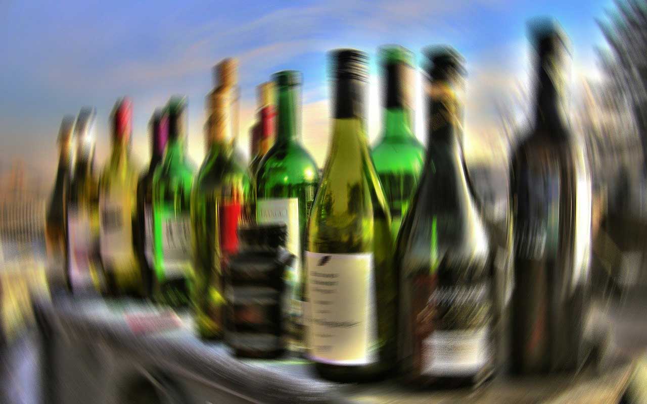 Blurry bottles, like the spinning sensation when a person has too much alcohol to drink.