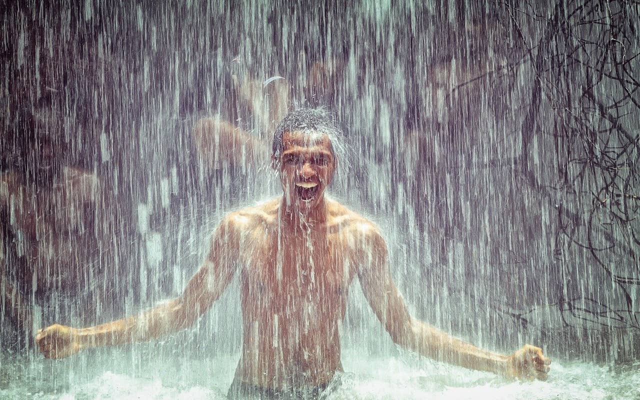 man in cold shower to help solve his concentration problem