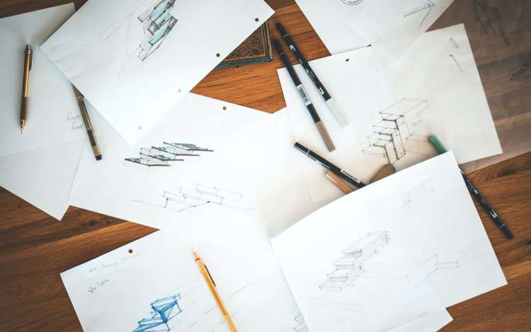 Ink sketches on a table. Visuospatial sketchpad is a way working memory stores information.