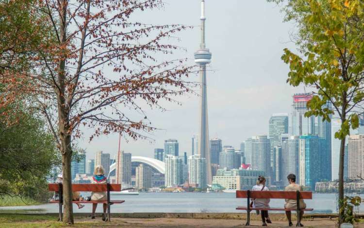 Two park benches near Lake Ontario in Toronto, Canada.