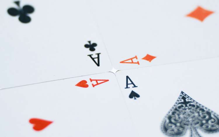 Four Aces out of a deck of cards. A deck of playing cards is very useful for learning memory techniques.