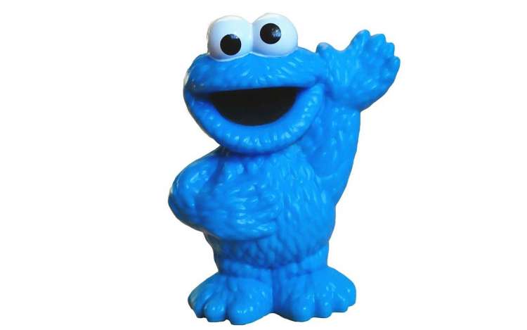 A picture of a Cookie Monster figurine. Cookie Monster is an example of a memorable character you could use with the Pegword system.