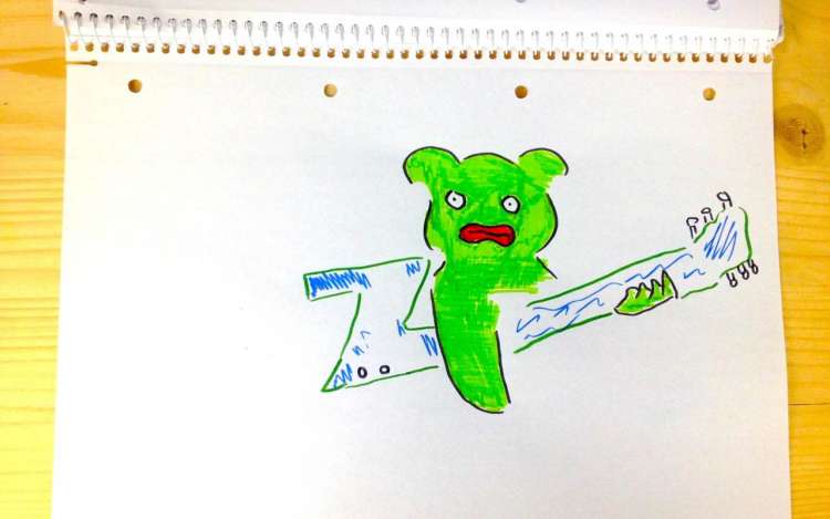 An illustration Anthony drew with a green creature playing a Z-shaped guitar.