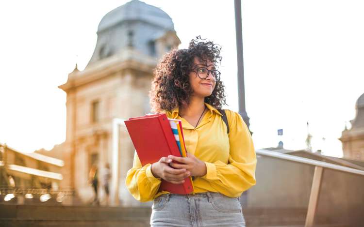 obstacles to critical thinking and problem solving a student walking with some books