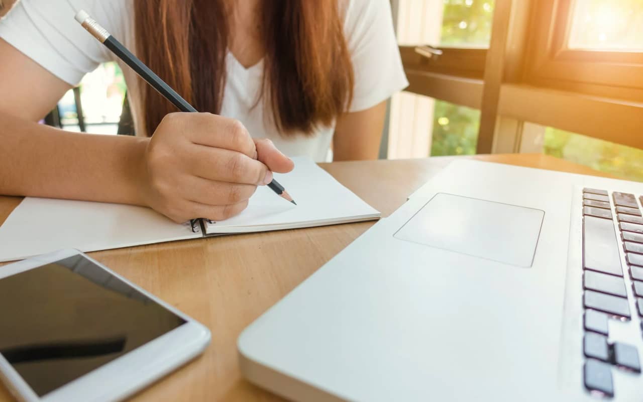 a woman focuses on study