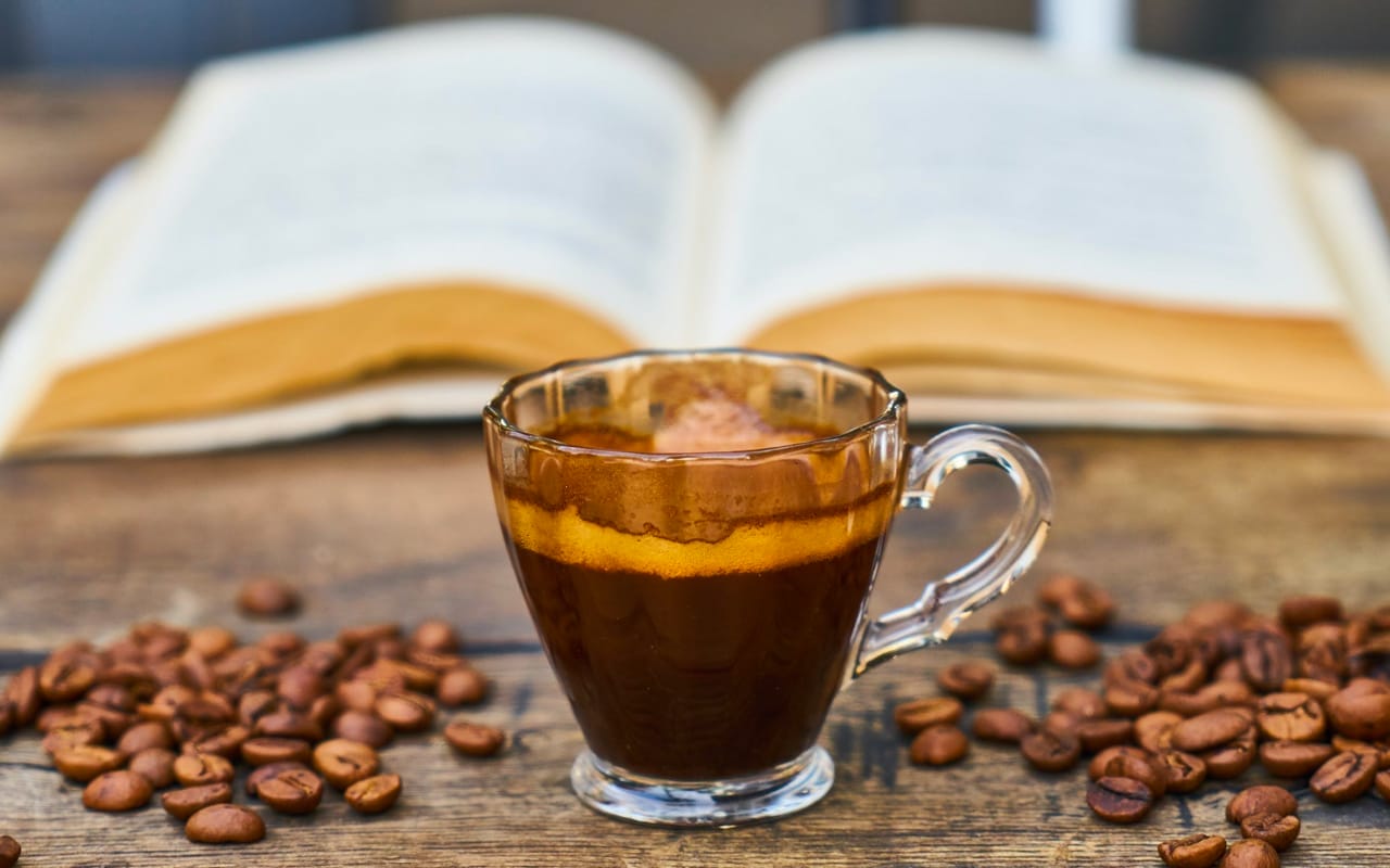 coffee and beans and a book