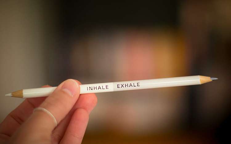 pencil with inhale and exhale on it to illustrate a health point related to stress-induced memory loss