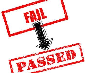 lower grades feature image of a failed and passed red rubber stamp