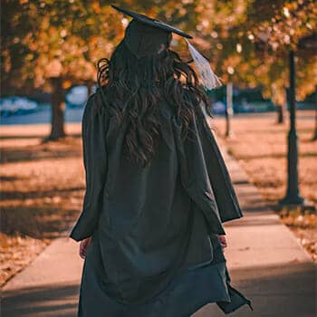 studying law feature image of a graduate student walking down a path