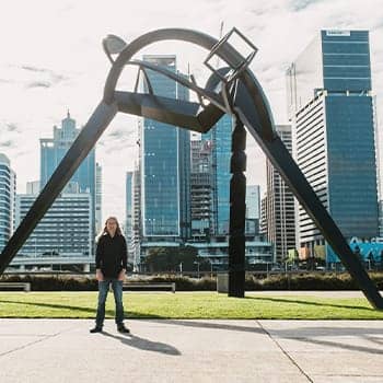 Anthony Metivier with a sculpture in Brisbane to express a concept related to how to improve cognitive function