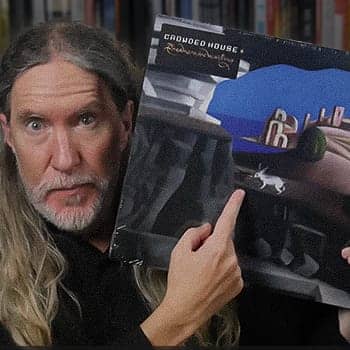 Using paintings as Memory Palaces feature image of Anthony Metivier holding a painted album cover